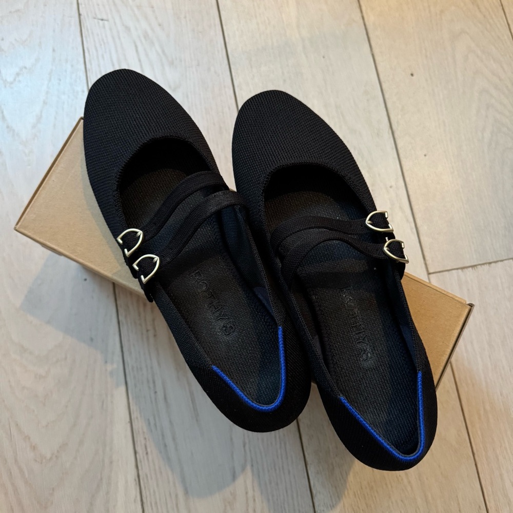 Rothy's Black Flats with Blue Trim and Gold Buckles